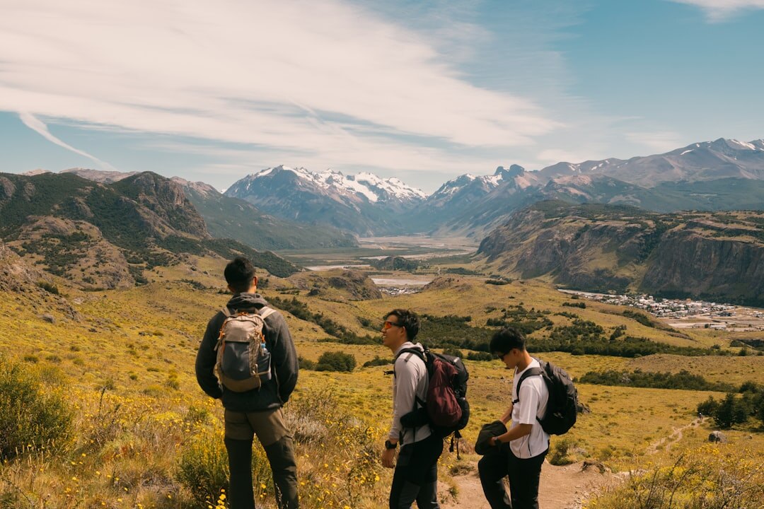 senior group hiking in mountains