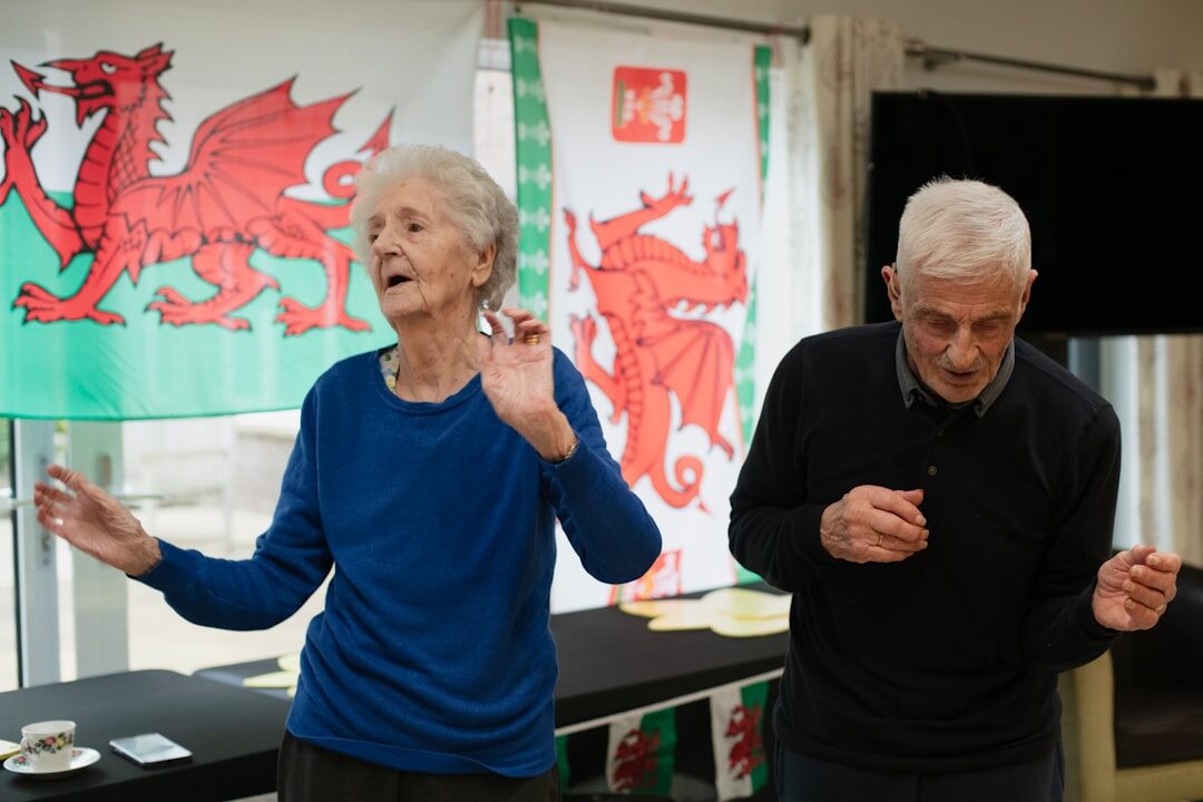 elderly friends chatting at event